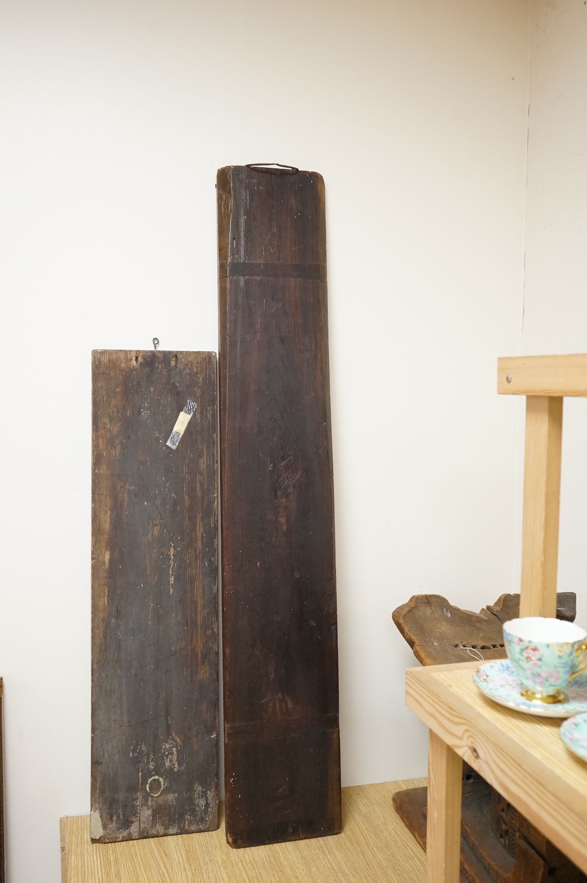 Two Vietnamese carved wood panels with calligraphy, largest 118cm high
